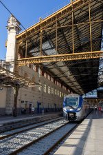 A Régio2N EMU stands underneath the grand shed of Marseille Saint-Charles 